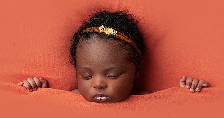 Beautiful photograph of baby girl taken by specialist newborn photographer in Olney near Bedford and Northampton and Milton Keynes