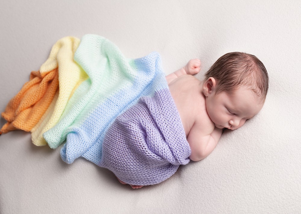Rainbow baby newborn photography Bedfordshire