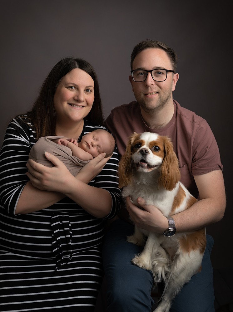 Newborn photography baby with dog