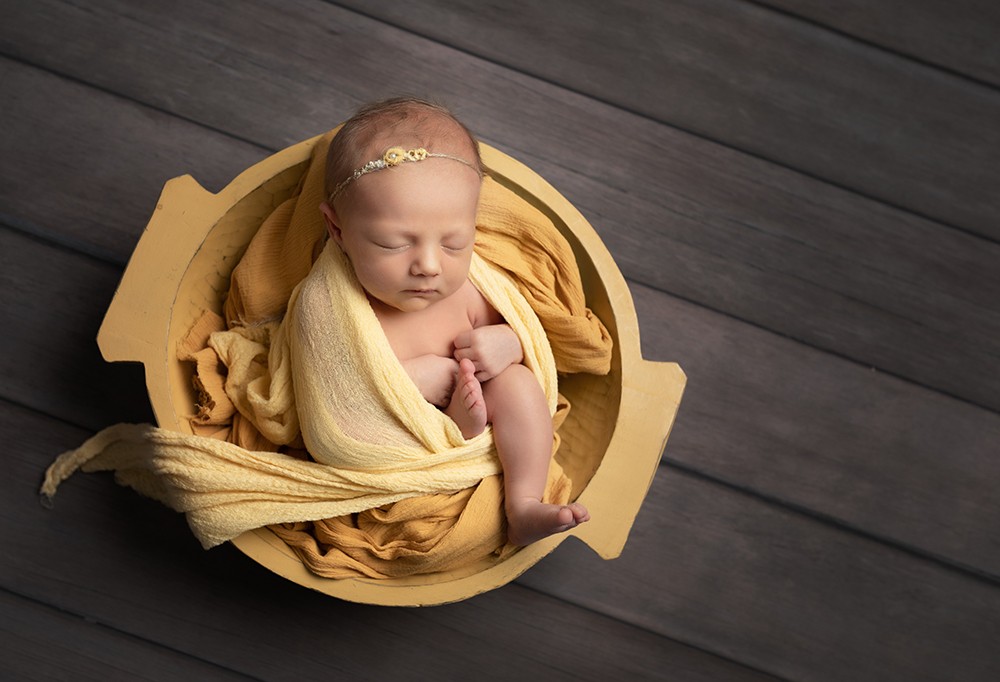 Newborn Photographer Northampton baby girl in yellow bowl